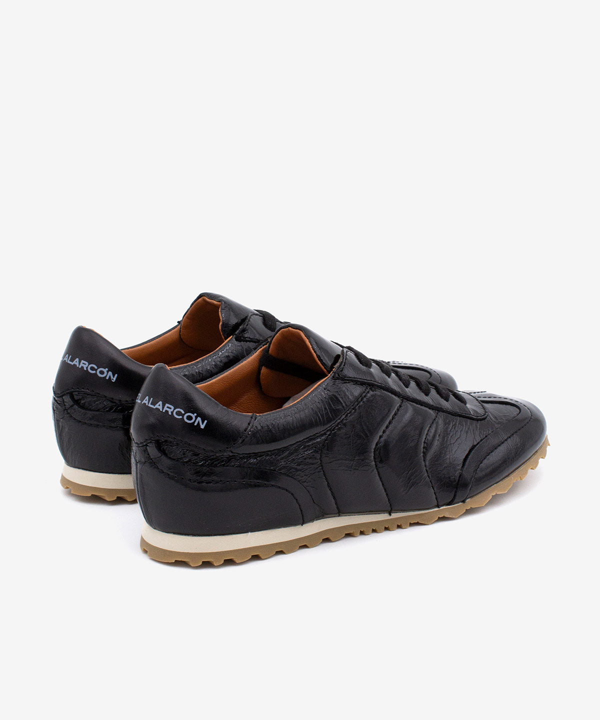 KESIA – Sneakers de piel brillante texturizada con suela de goma dentada – negro – Talla 38 – Ángel Alarcón