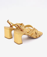 AURORA – Sandalia de tiras acolchadas con tacón ancho de piel metalizada – oro – Talla 37 – Ángel Alarcón